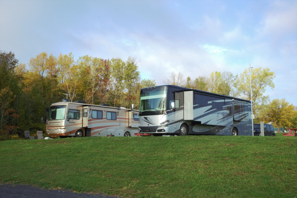 rvs parked by lake champlain in verrmont